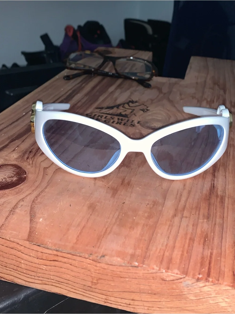 White Oval Sunglasses with Light Blue Lenses